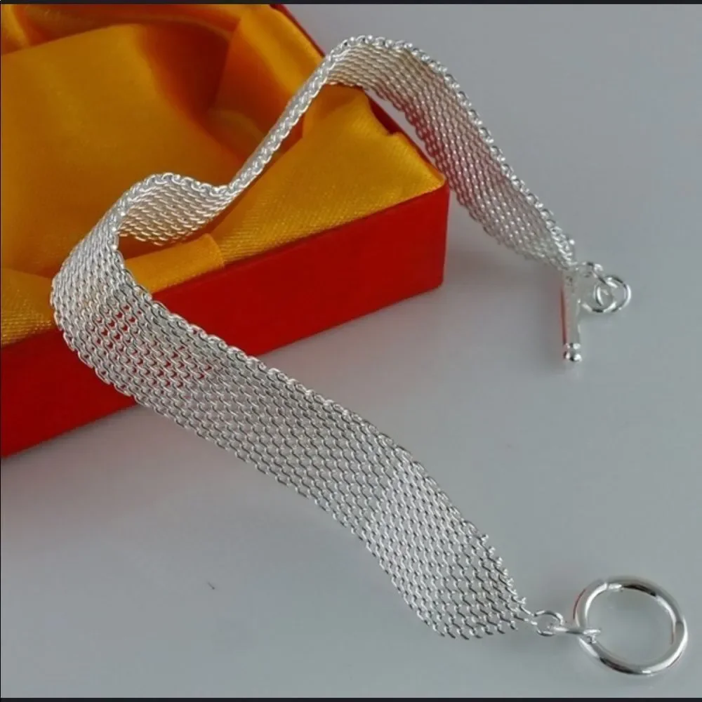 1/2” wide sterling silver plated wide mesh toggle bracelet